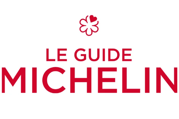 Illustration de l’article « Le Guide Michelin et ses étoiles : quand les pneus se sont invités à table ! »